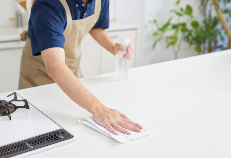 wiping a quartz countertop