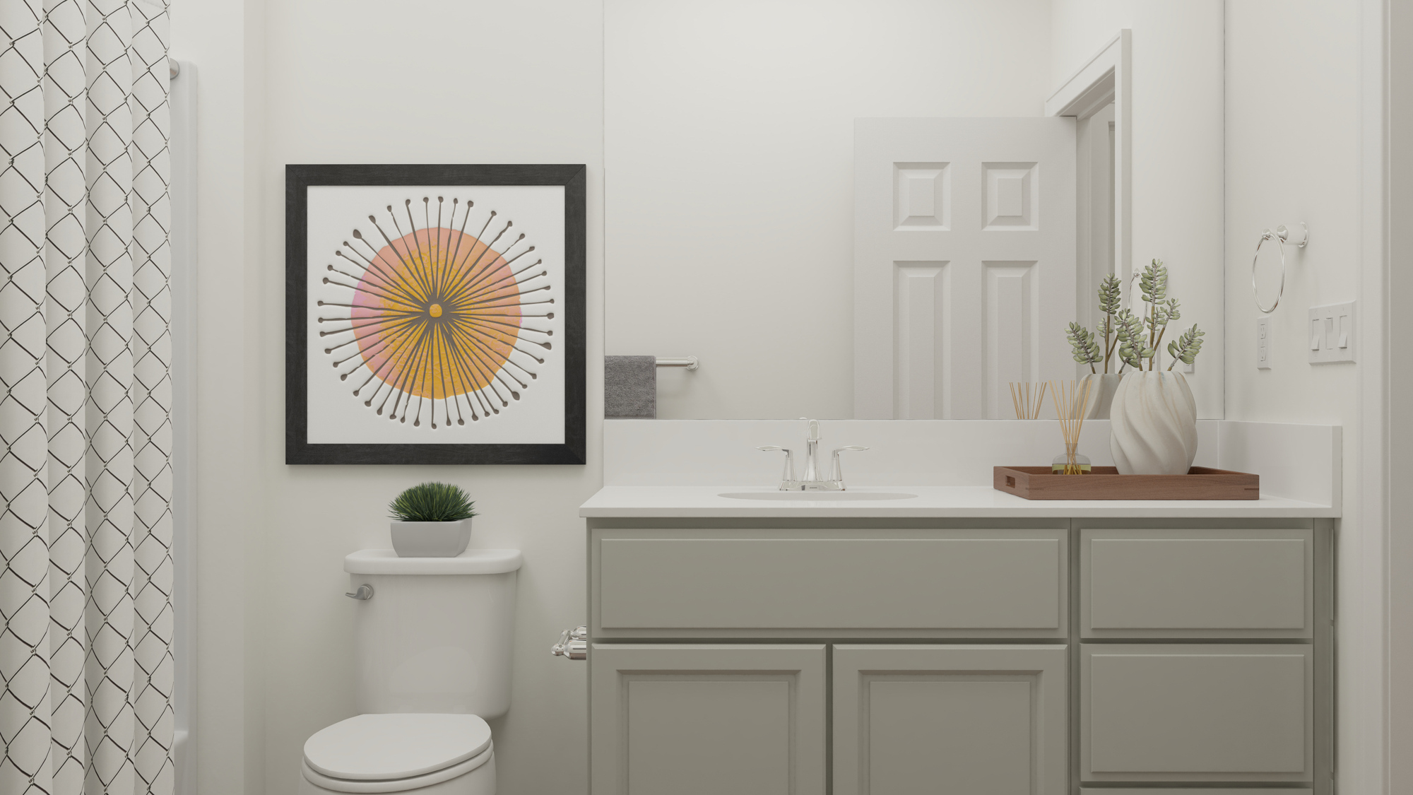 A bathroom with a white wall.