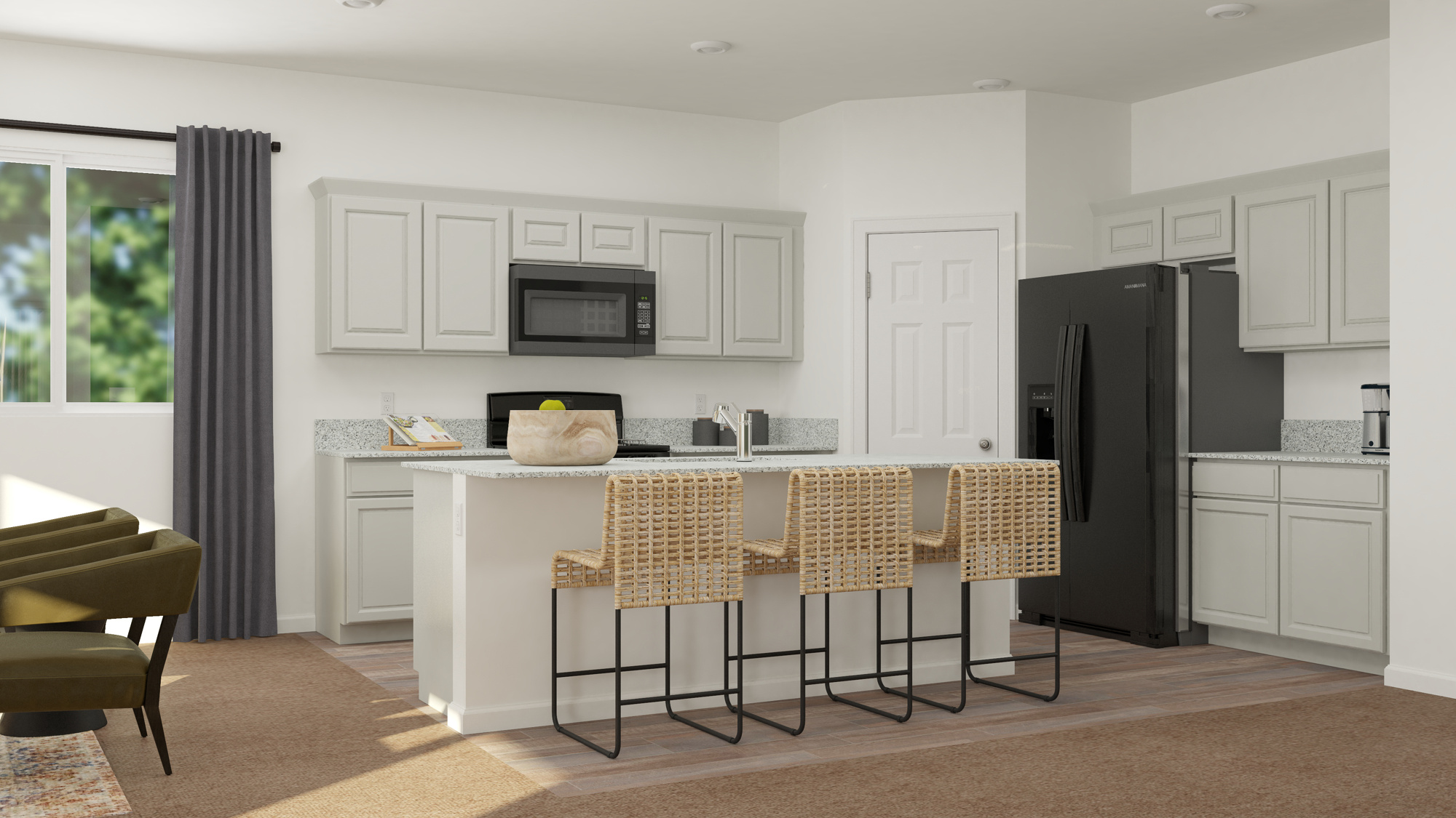 A kitchen with white cabinets.