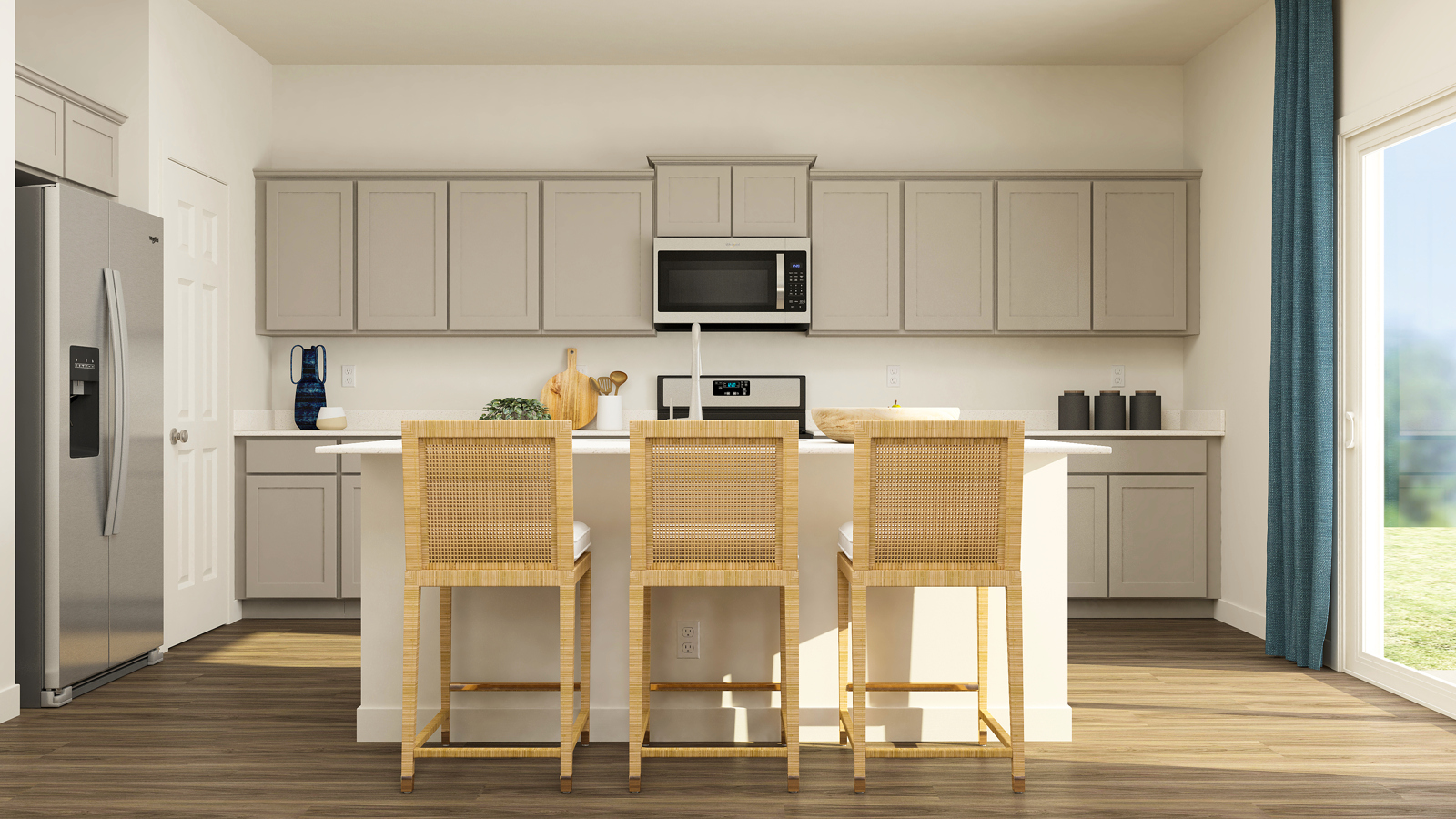 A kitchen with white cabinets.