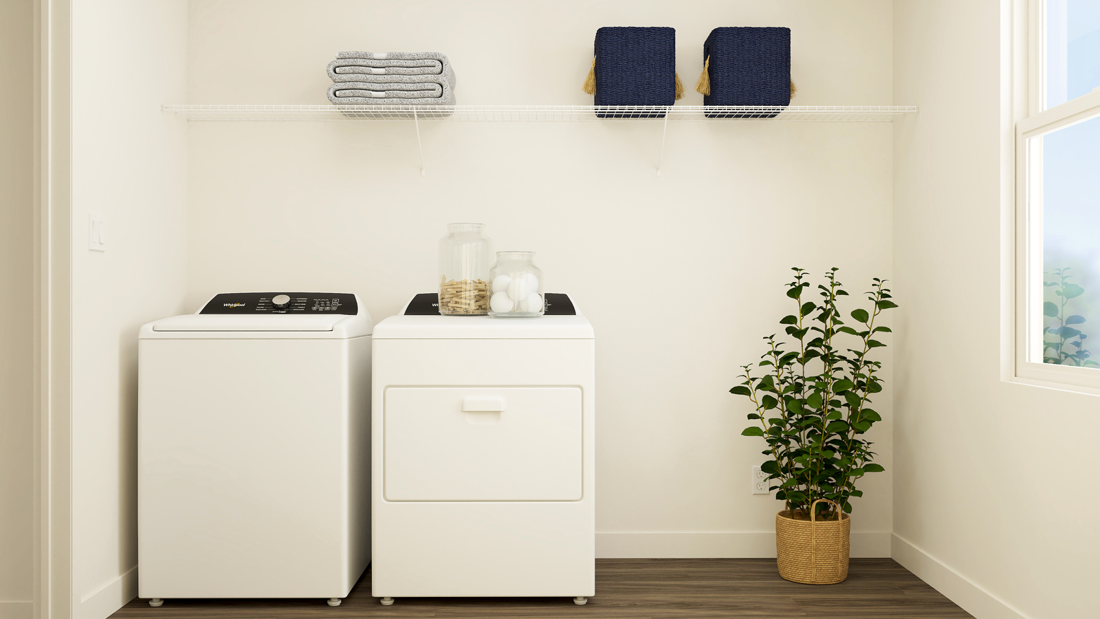 A white cabinet with a plant and a white refrigerator.
