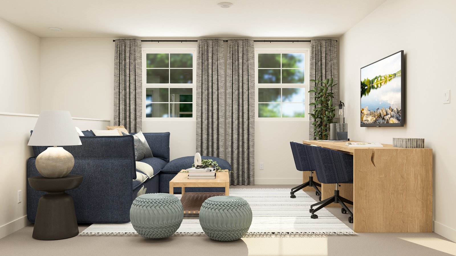 A living room with a blue couch and a table.