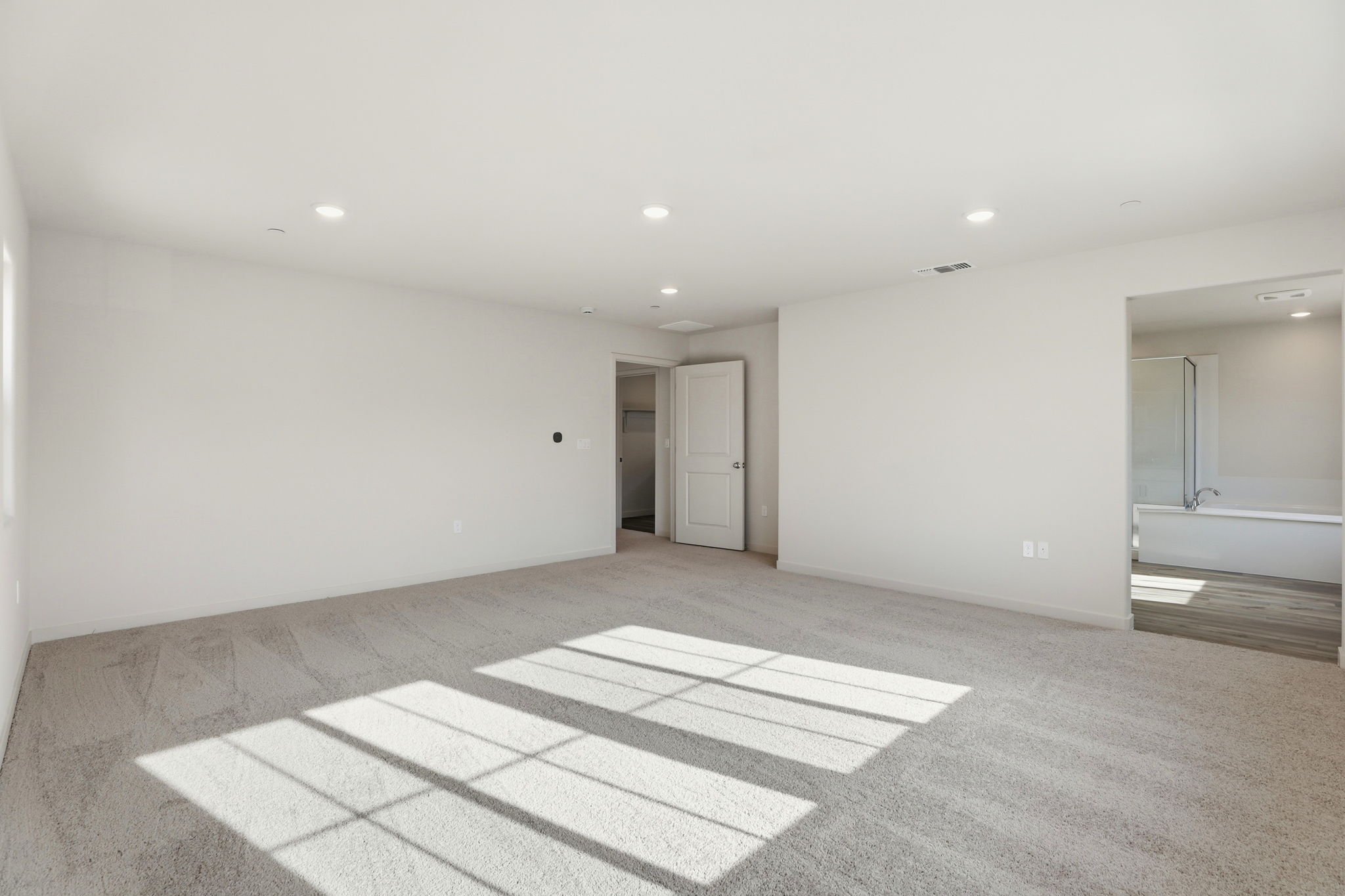 A room with a tile floor and a tile floor.
