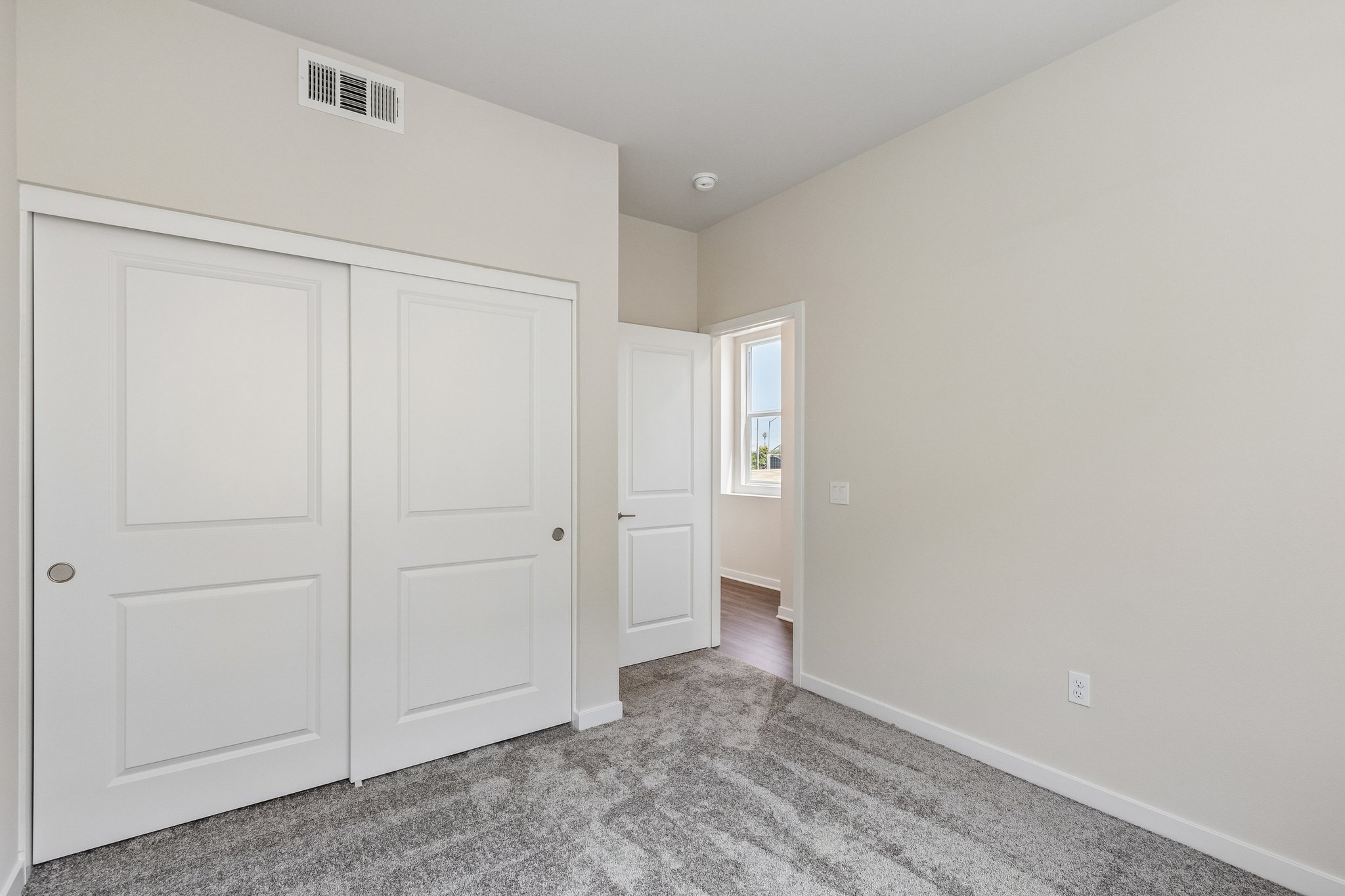 A room with white doors.