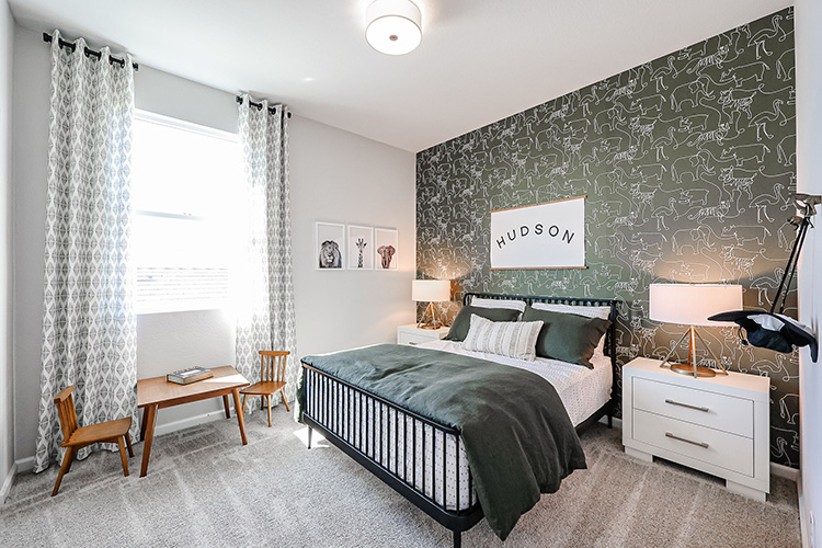 A bedroom with two beds.