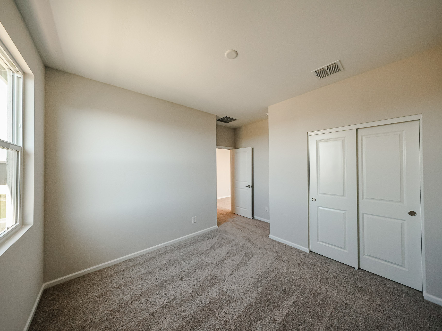 A room with white doors.