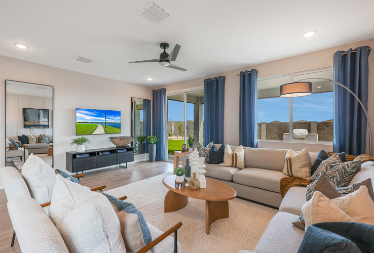 A living room with a large window.