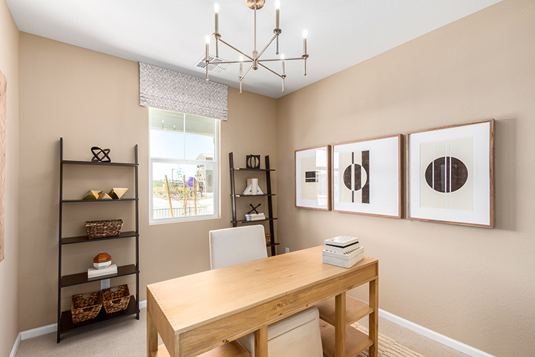 A room with a table and shelves.