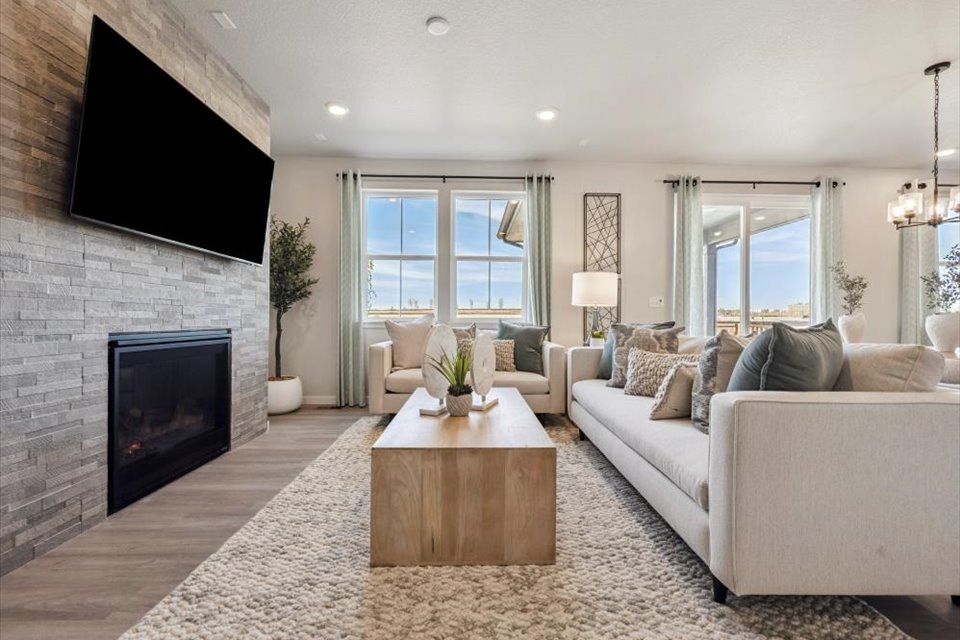 A living room with a fireplace.