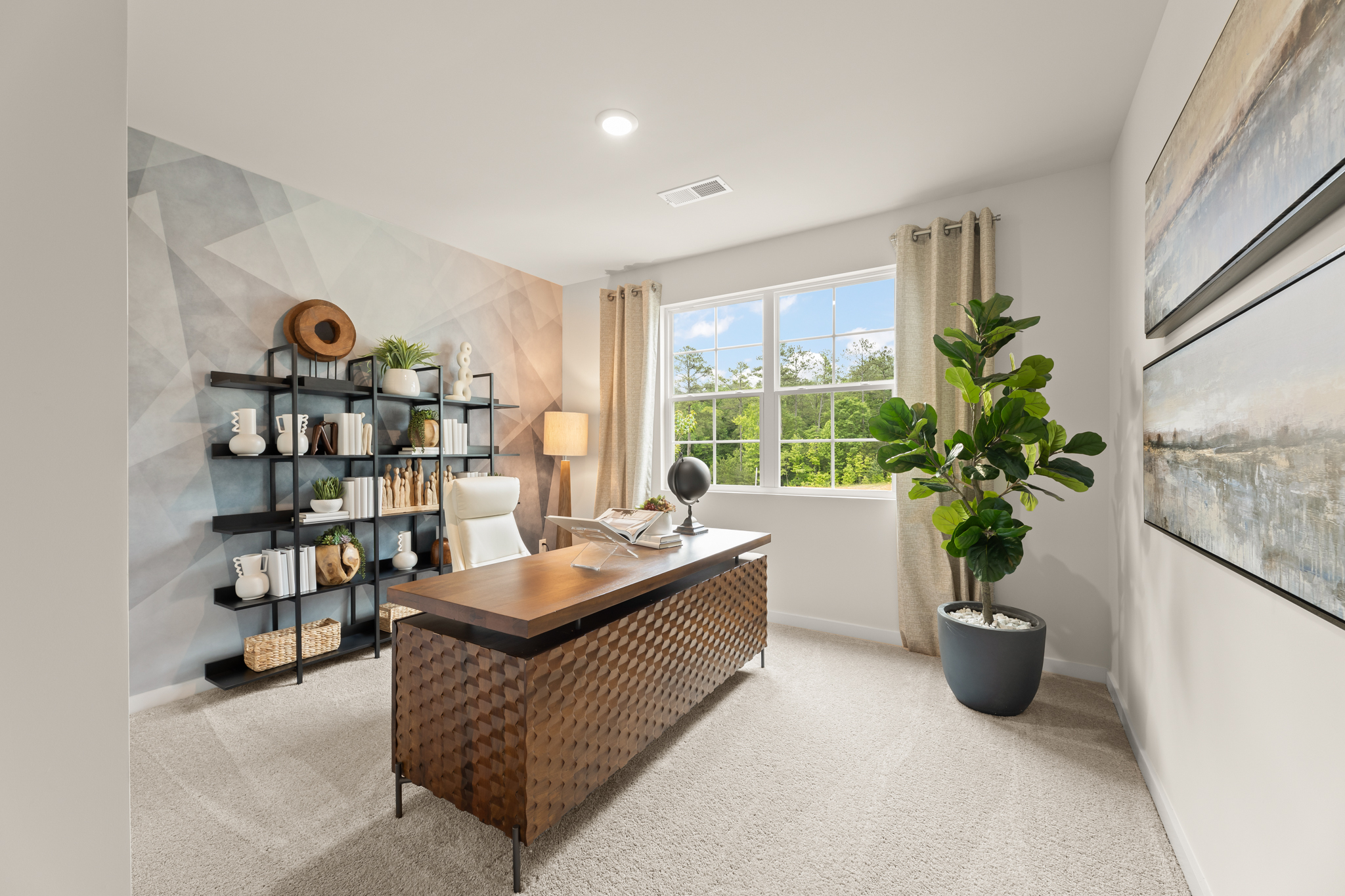 A room with a table and shelves.