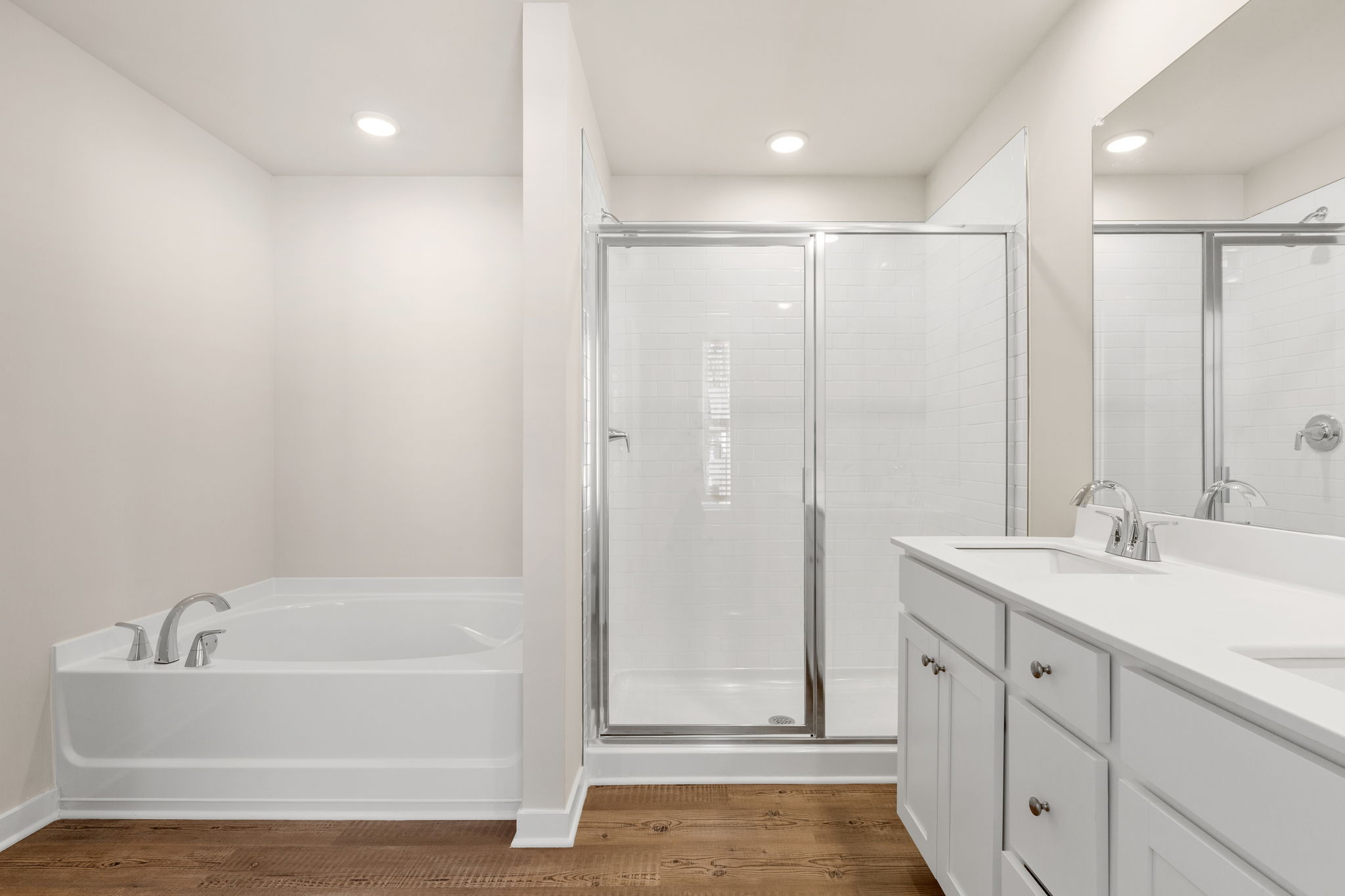 A bathroom with a glass shower.