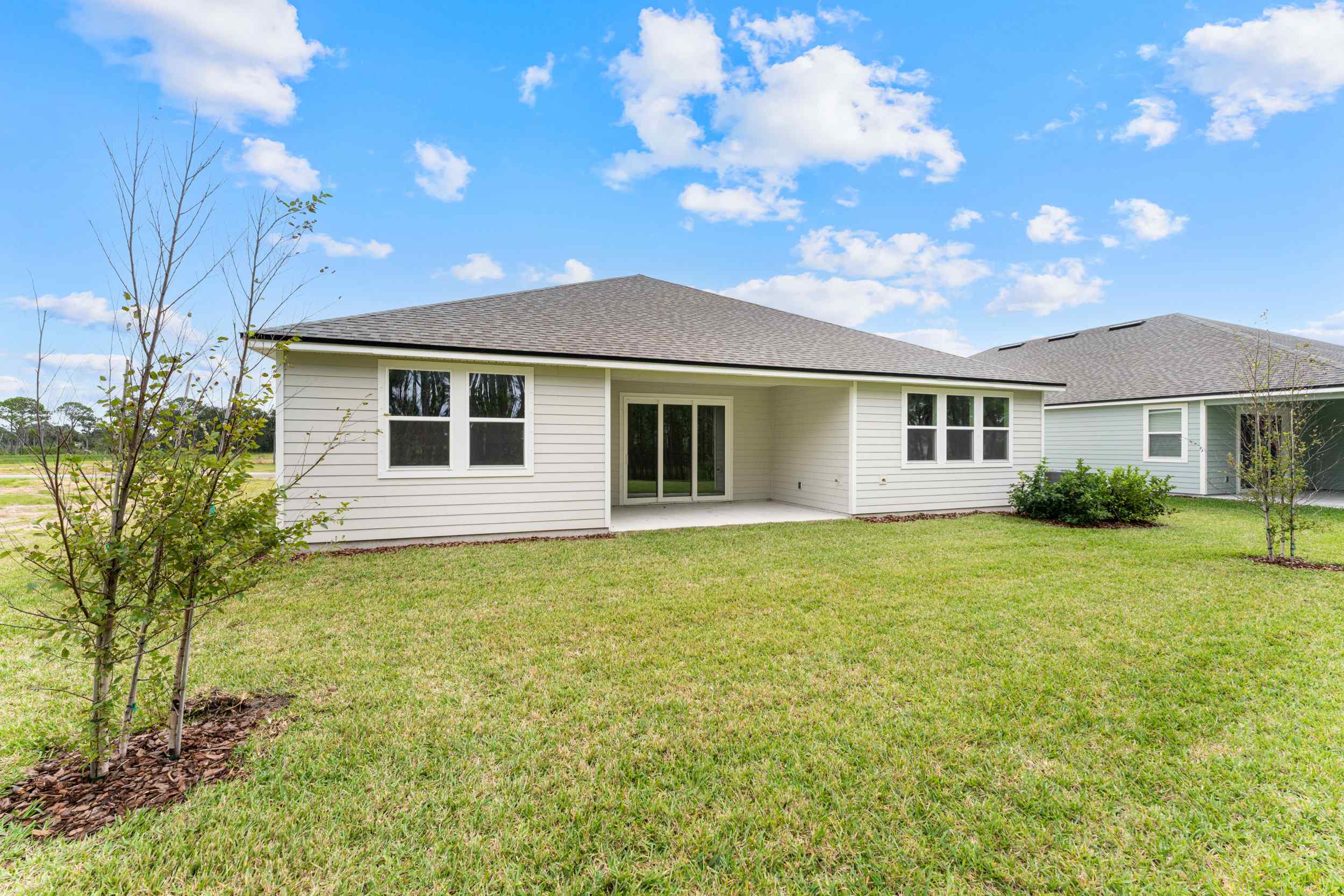 Lot 190 Rear Exterior with Covered Patio at Reserve East in Flagler Beach