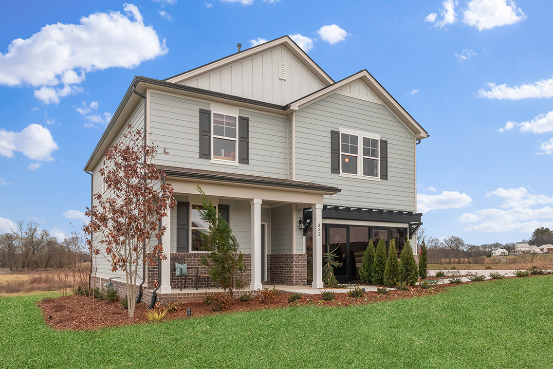A house with a yard and trees.