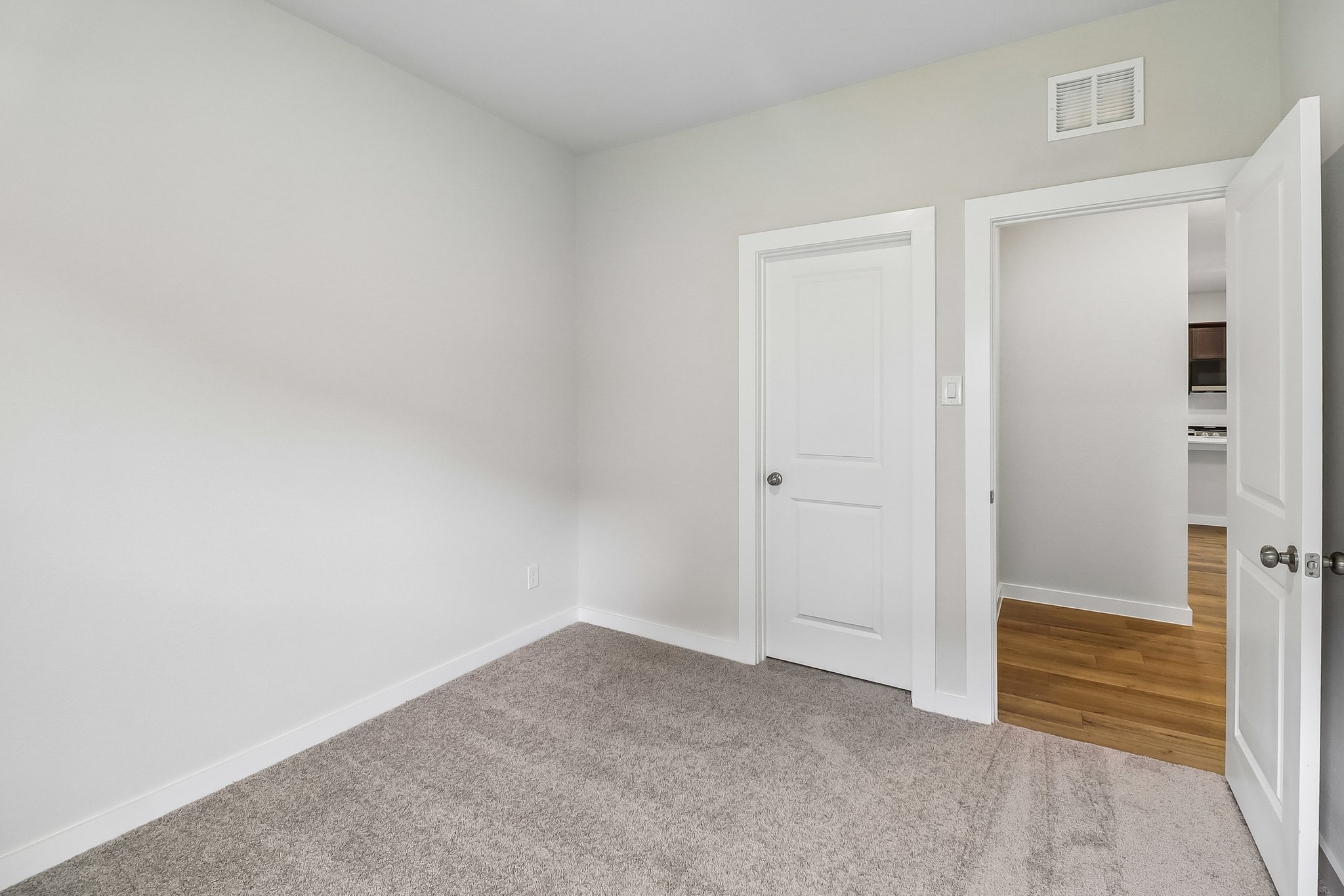 A room with white doors.
