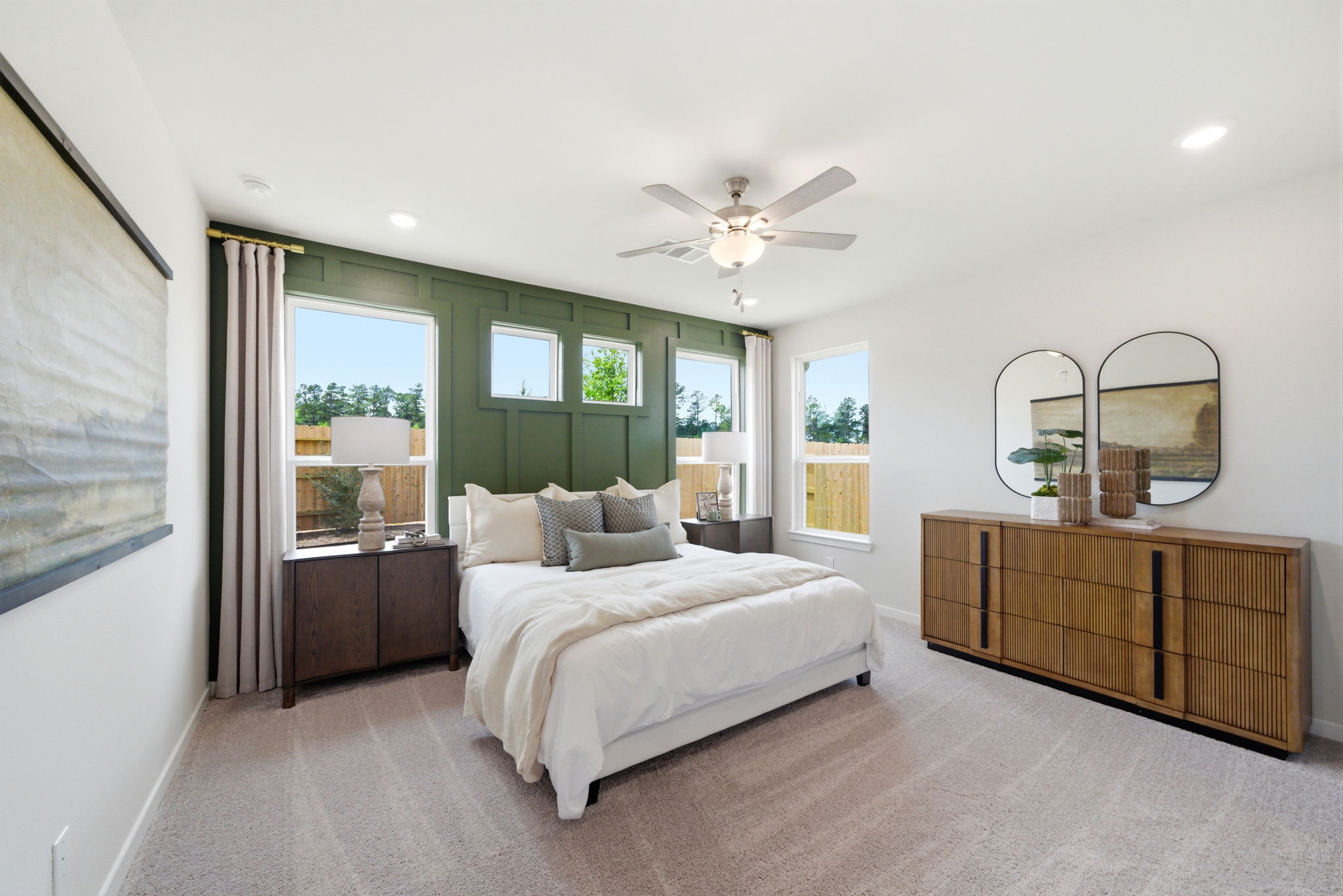 A bedroom with a large bed.