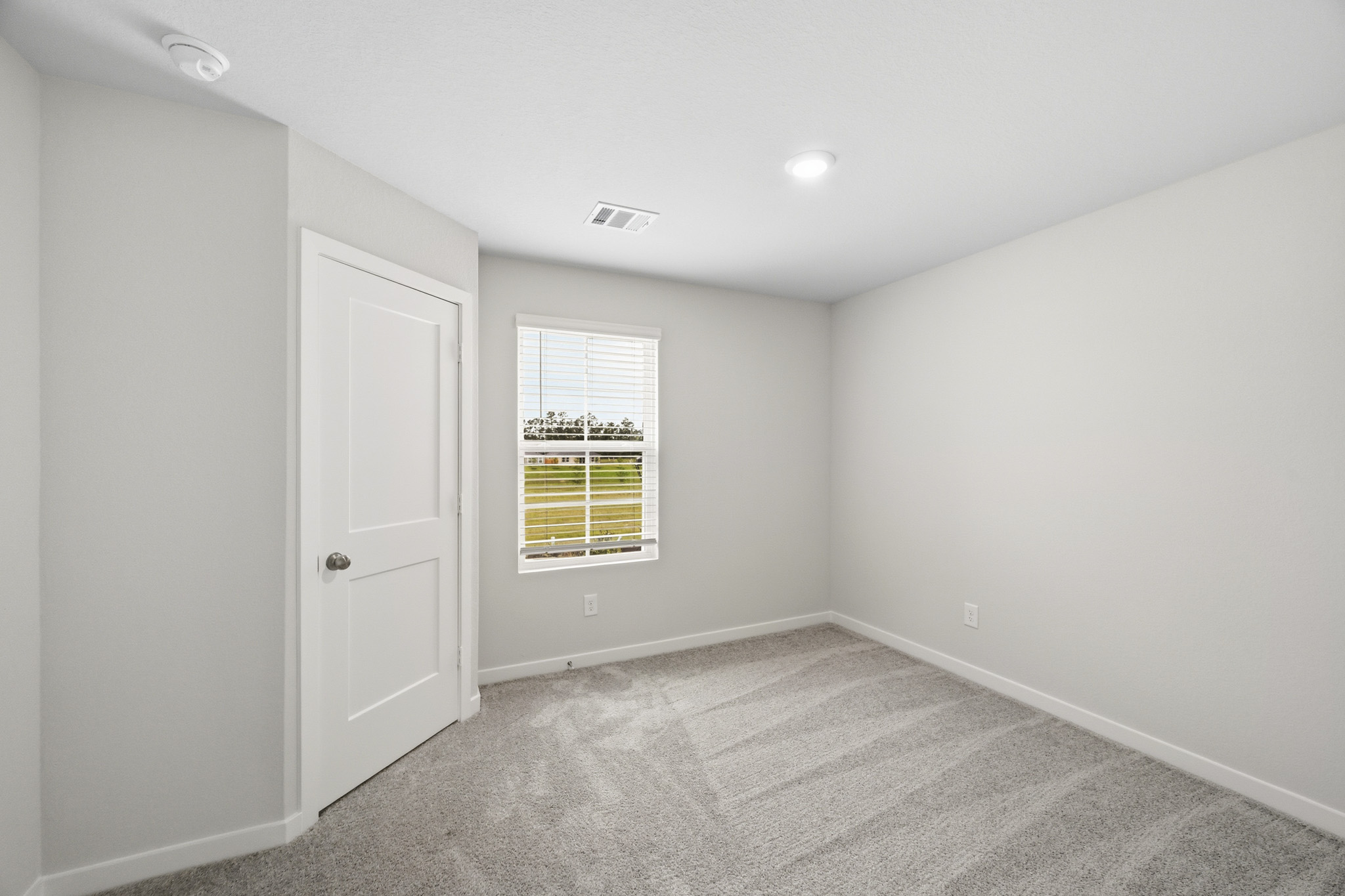 A room with white doors.