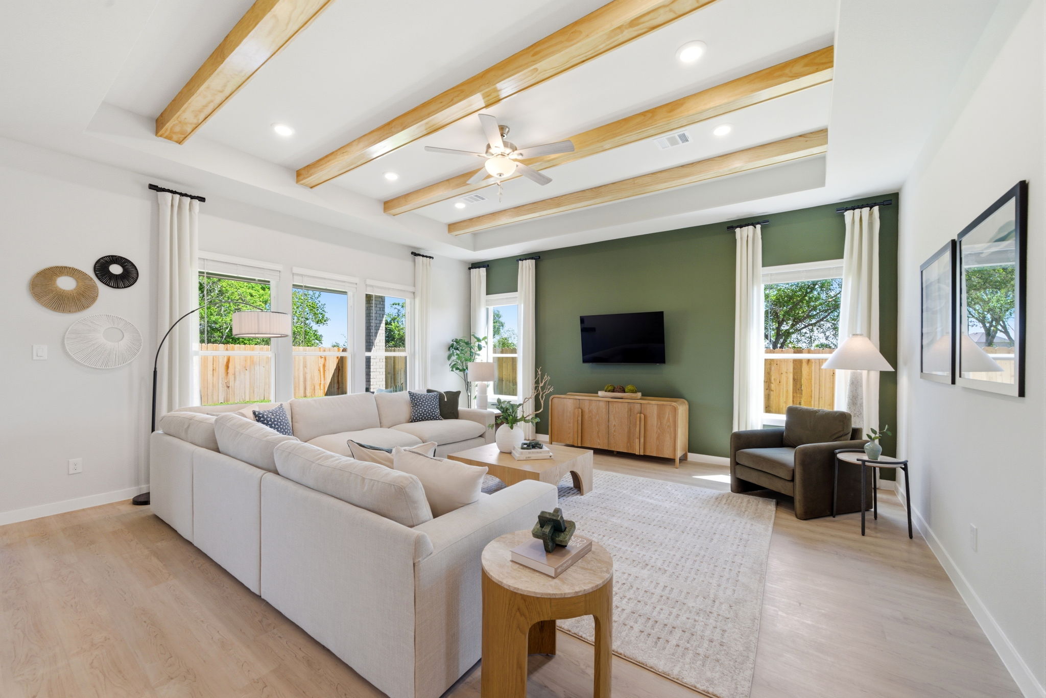 A living room with a white couch.