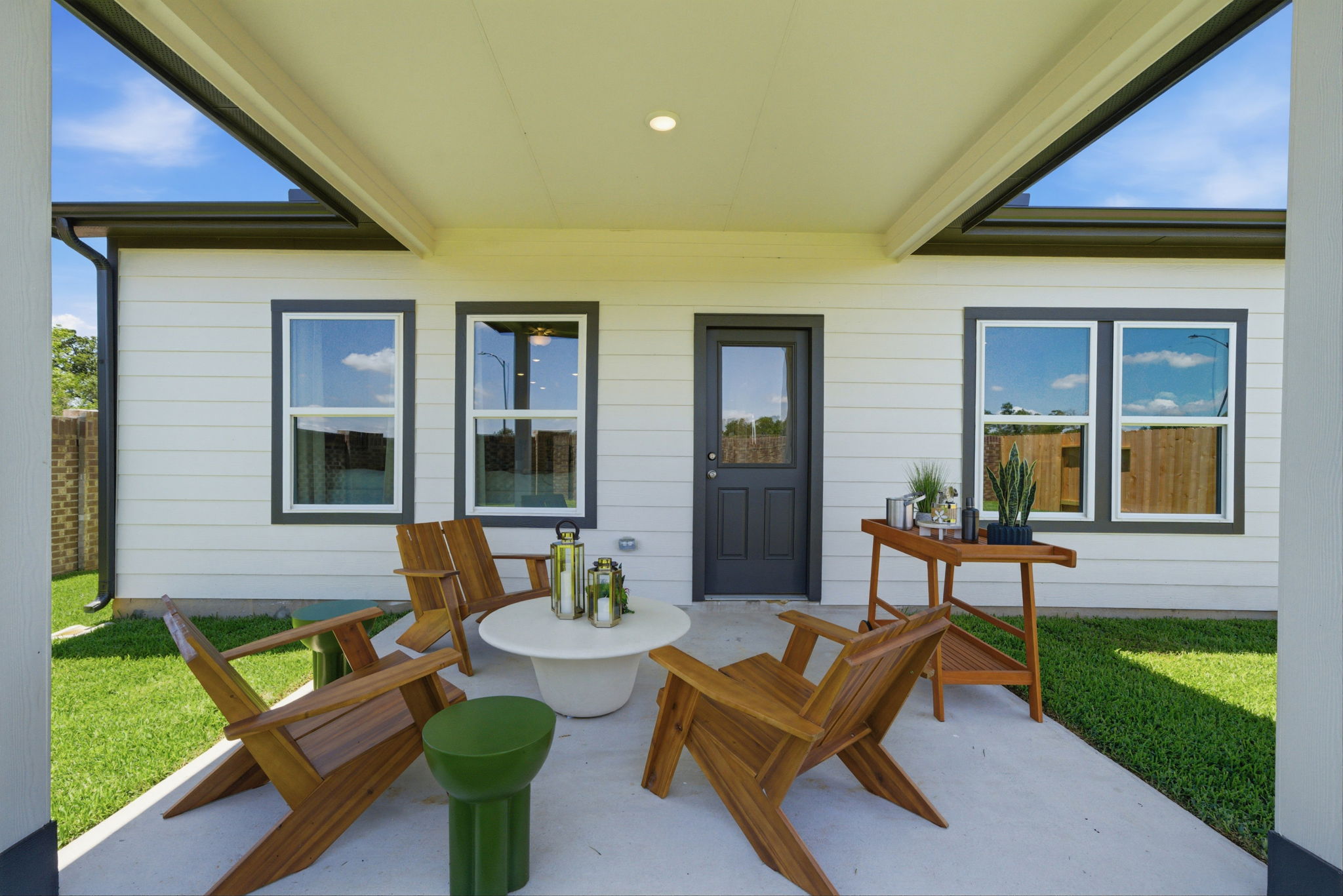 A house with a table and chairs.