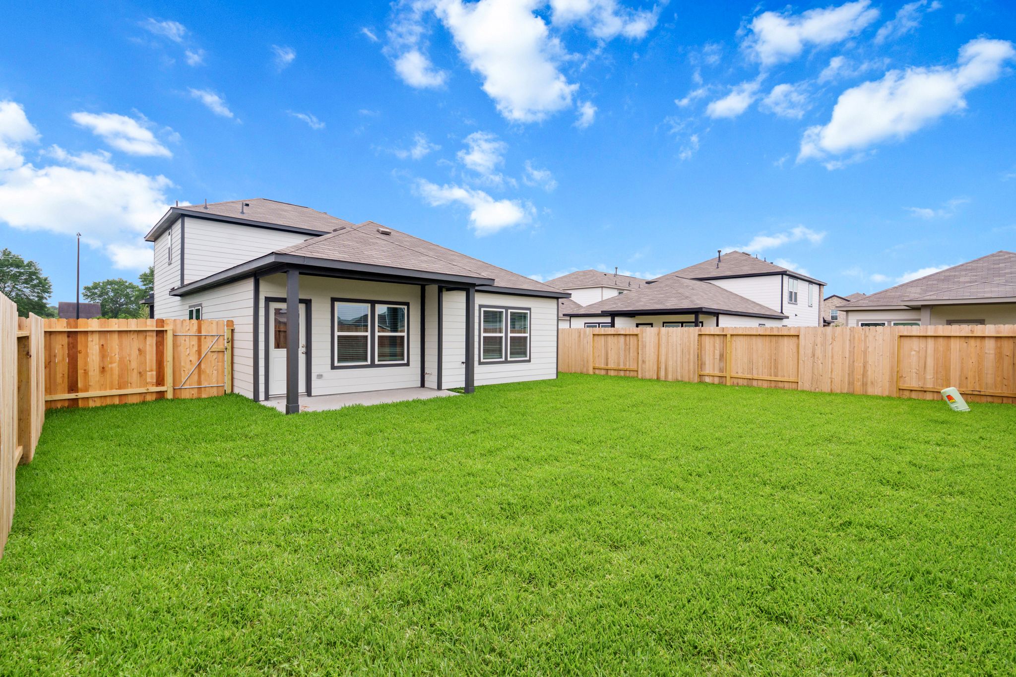 A house with a fence around it.