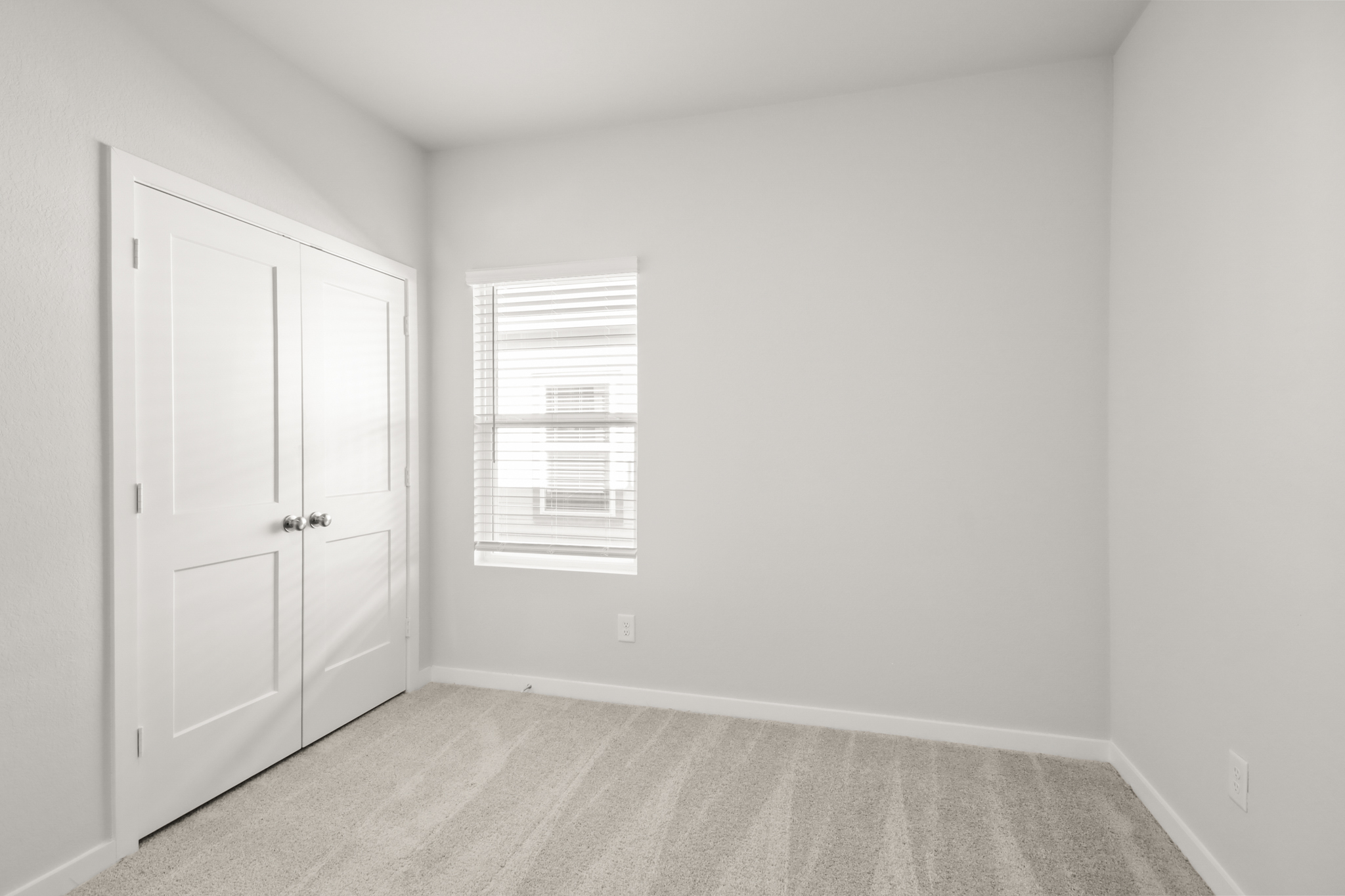 A room with white doors.