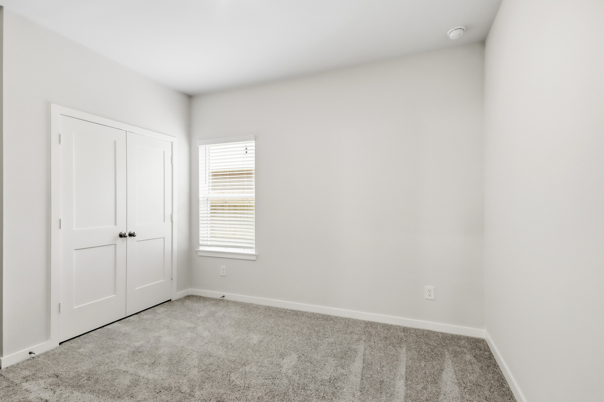 A room with white doors.