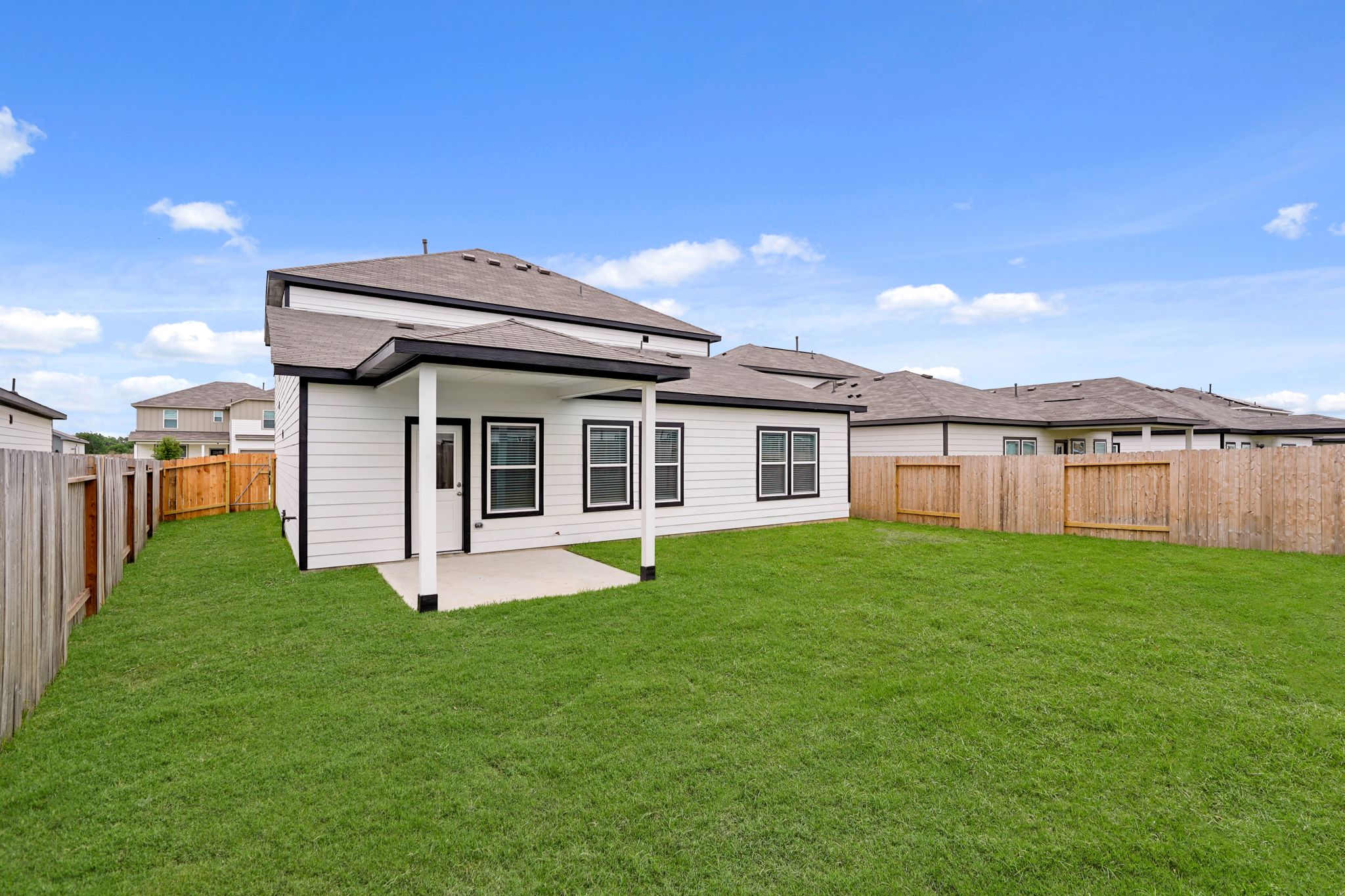 A house with a fence around it.