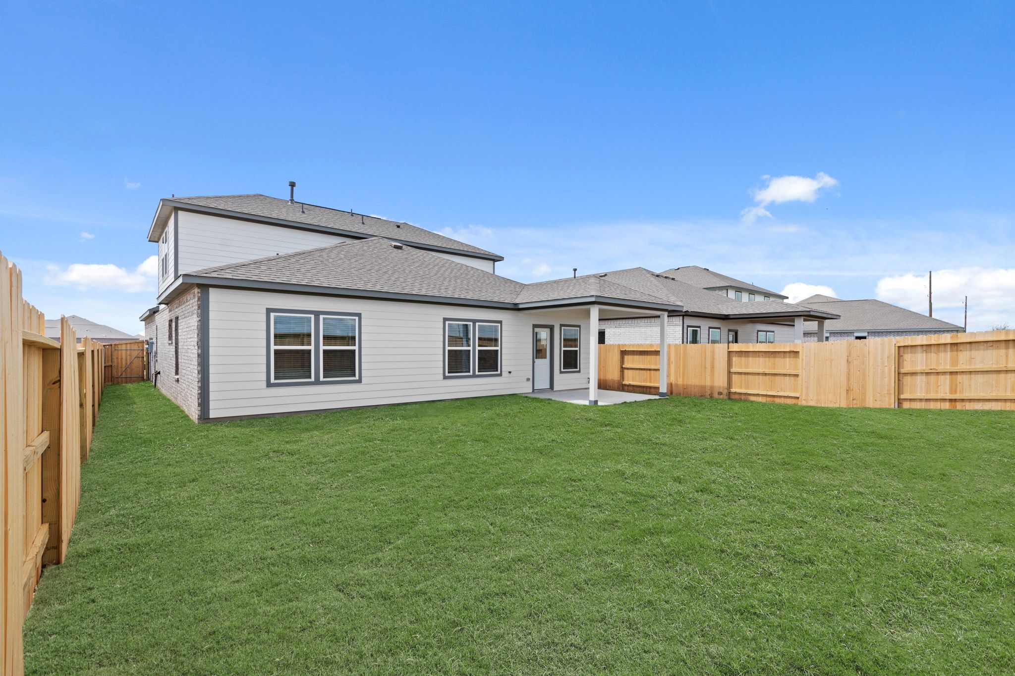A house with a fence around it.