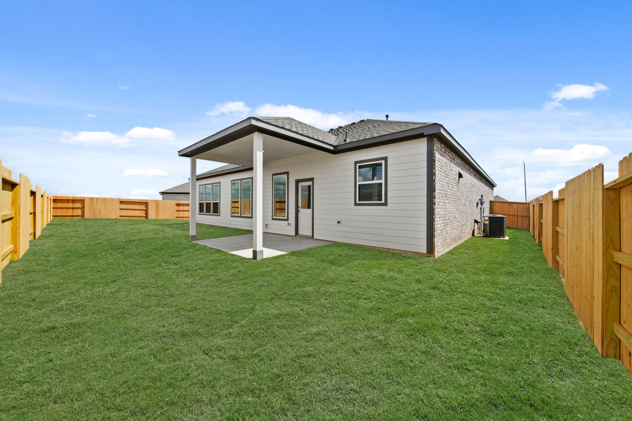 A house with a fence around it.
