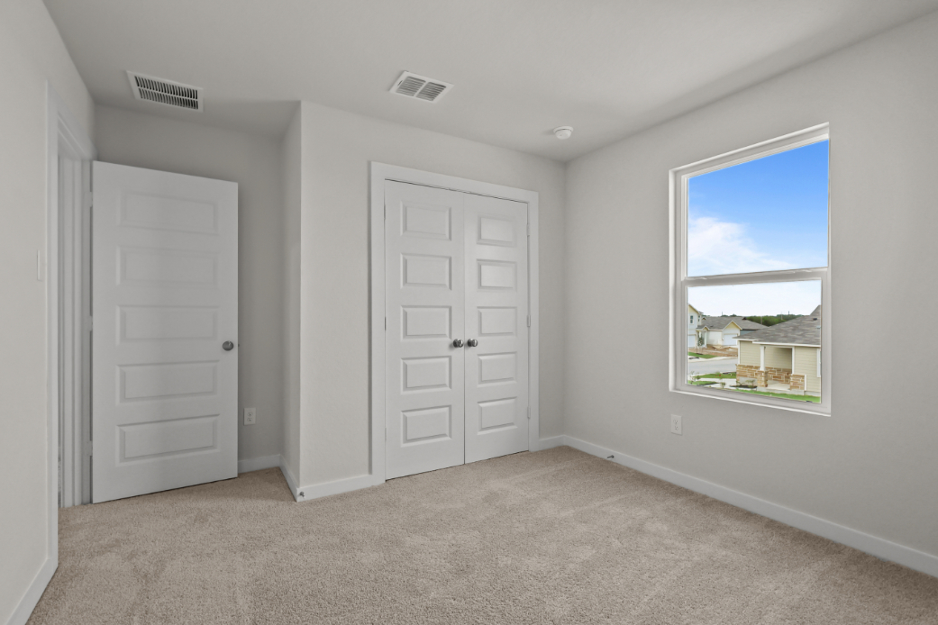 A room with white doors.