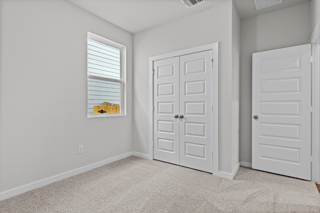 A room with white doors.
