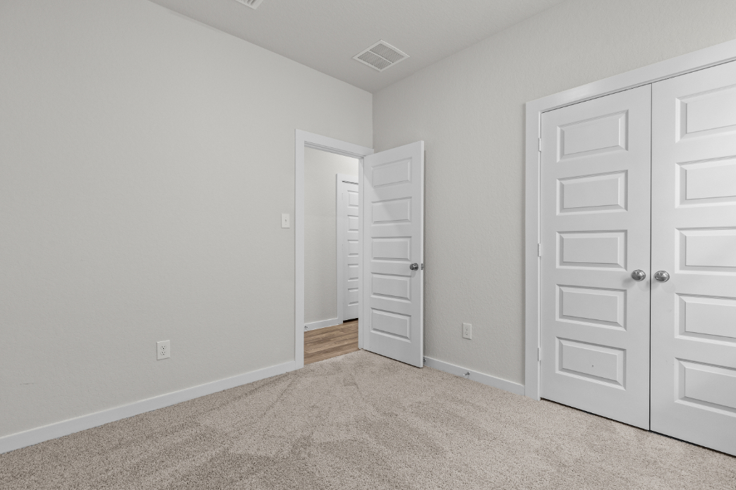 A room with white doors.