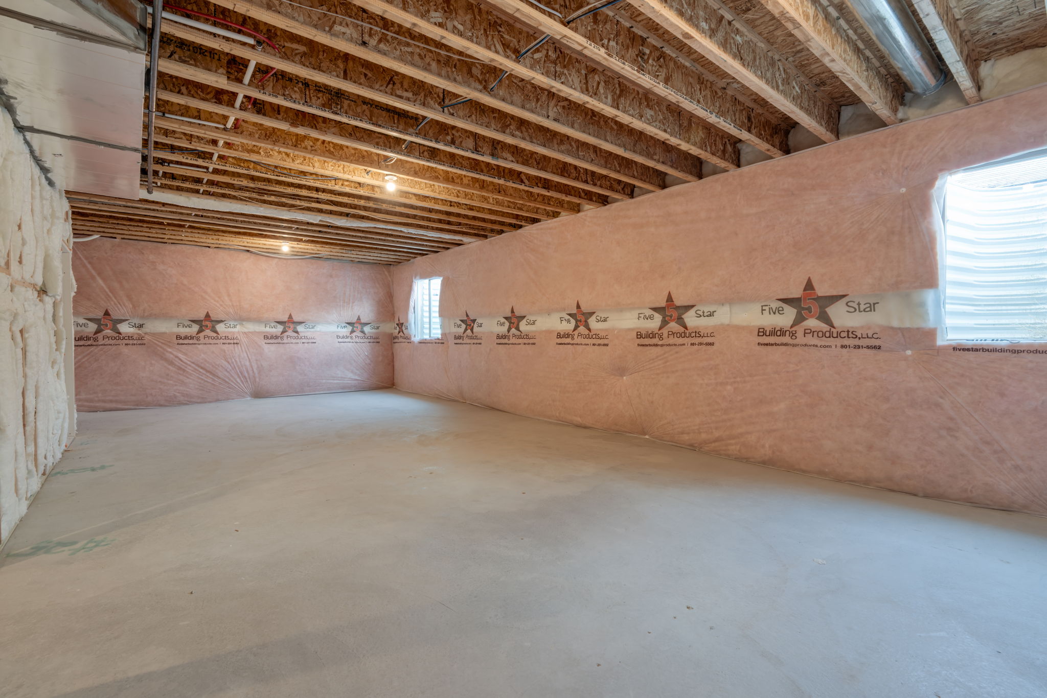 A room with a large wooden ceiling.