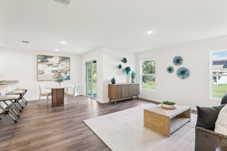 A room with a wood floor and a wood floor with a white wall and a wood floor with.