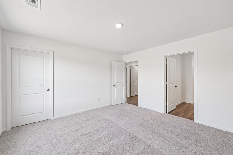 A room with white doors.