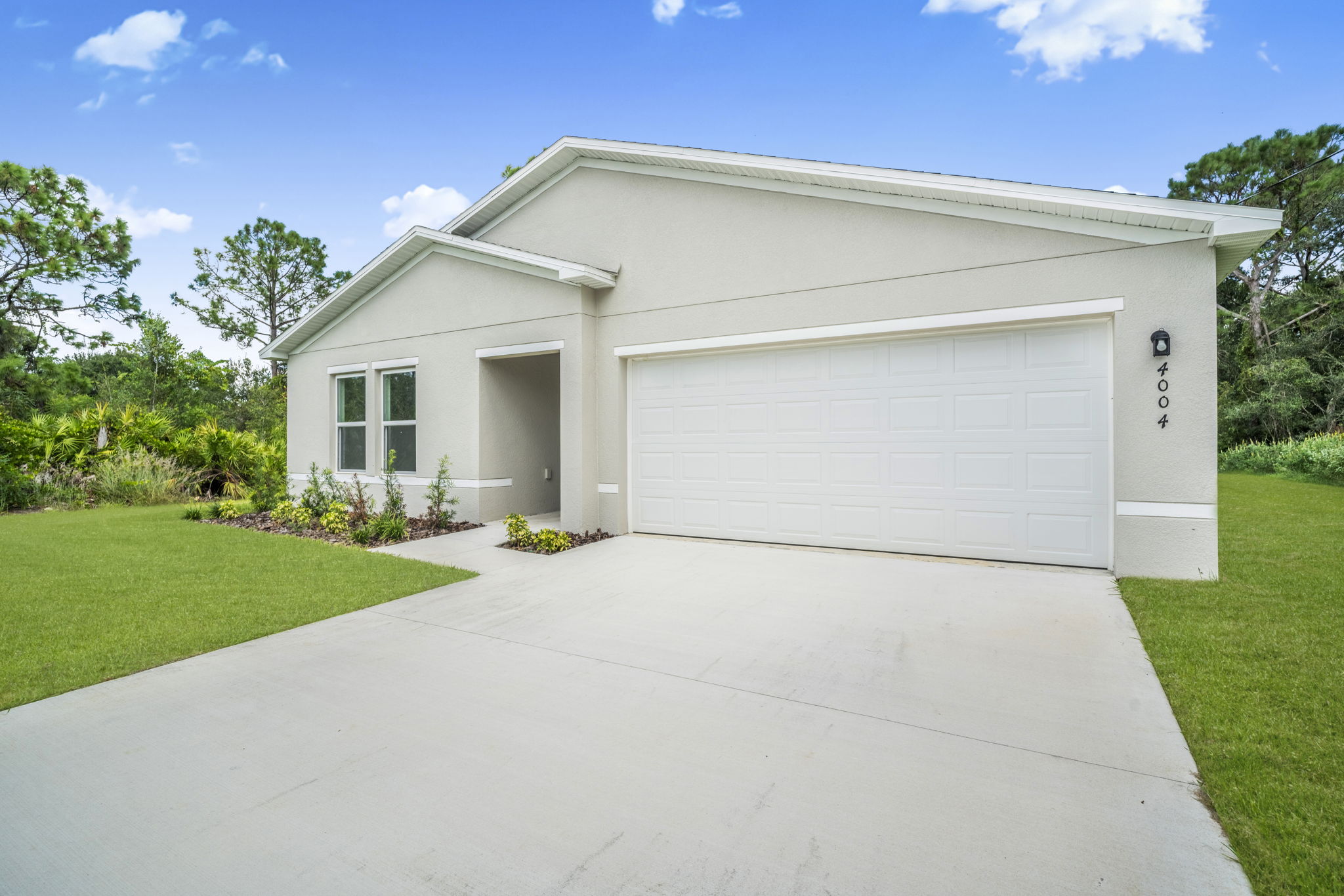 A garage with a driveway.