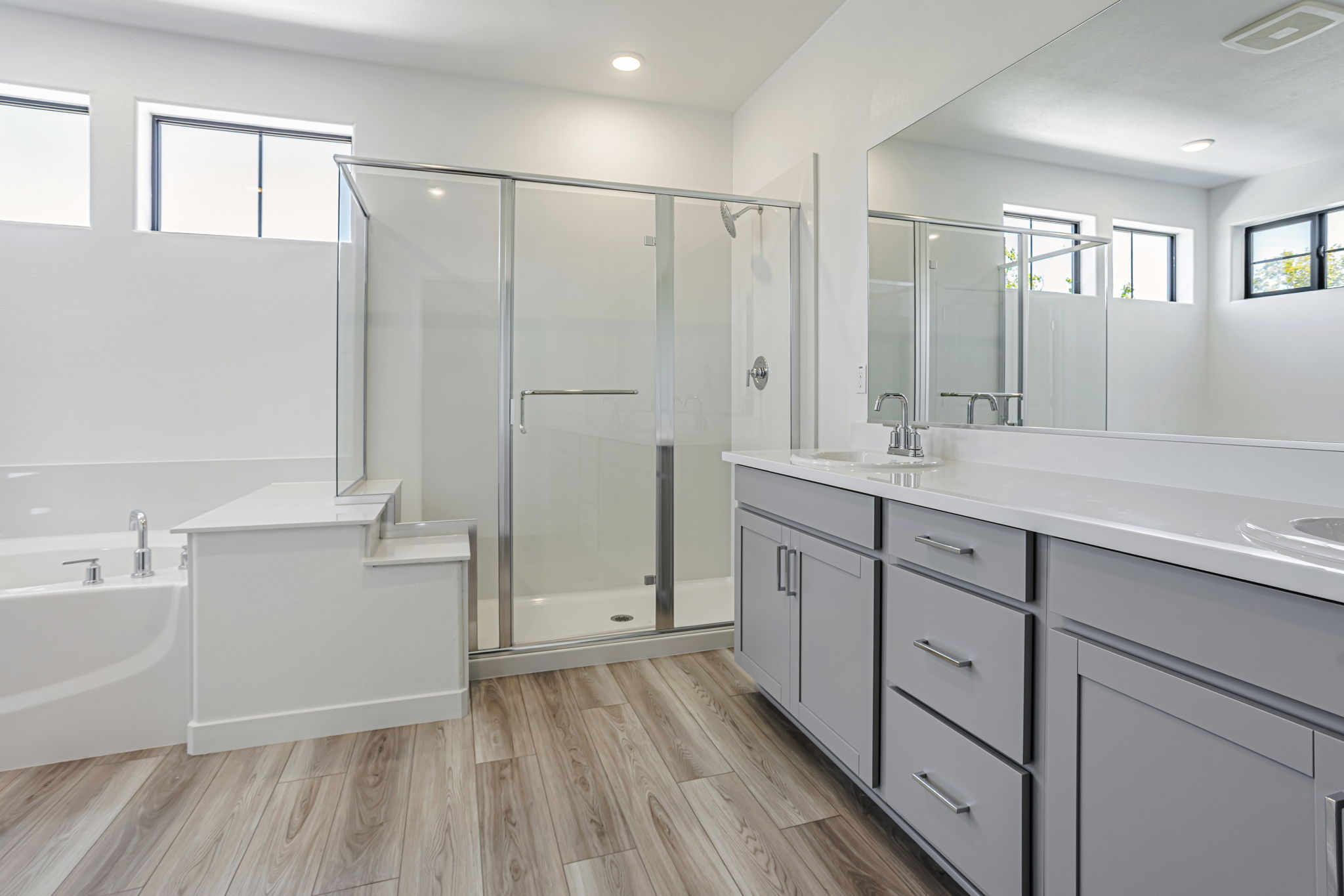 A bathroom with a glass shower.